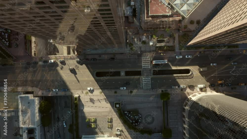 Looking down on Skyline Skyscraper Rooftops of Downtown Los Angeles in beautiful Sunset light, Birds Eye Overhead Top Down View Looking down on Skyline Skyscraper Rooftops of Downtown Los Angeles in beautiful Sunset light, Birds Eye Overhead Top Down View