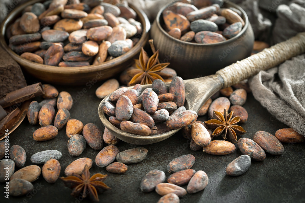 Cocoa beans on an old background. Cocoa beans on an old background.