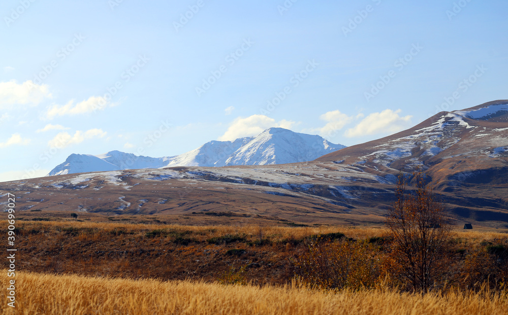 Photo of a beautiful autumn landscape with mountains