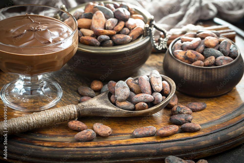 Cocoa beans on an old background. Cocoa beans on an old background.