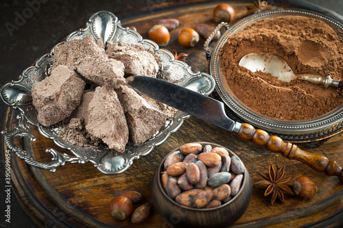 Cocoa beans on old background