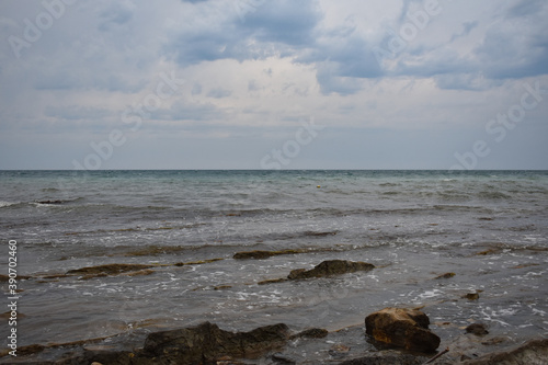 stone beach in cloudy weather