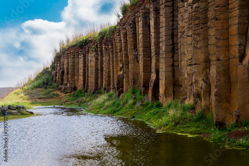 Terracotta columnar basalt columns on the tropical island of Penghu Taiwan. Geological lava plateau.