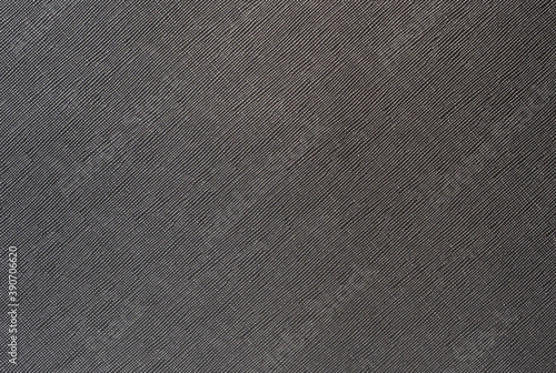 grey background from a textile material with wicker pattern, closeup.