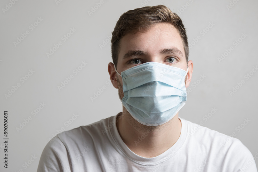 Boy with a mask to protect himself from viruses and bacteria looking at the camera or in front Boy with a mask to protect himself from viruses and bacteria looking at the camera or in front