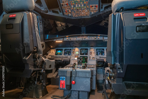 modern airplane cockpit in a full flight simulator - a state of the art training device 