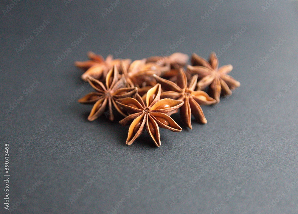 Star anise on grey stone background Star anise on grey stone background