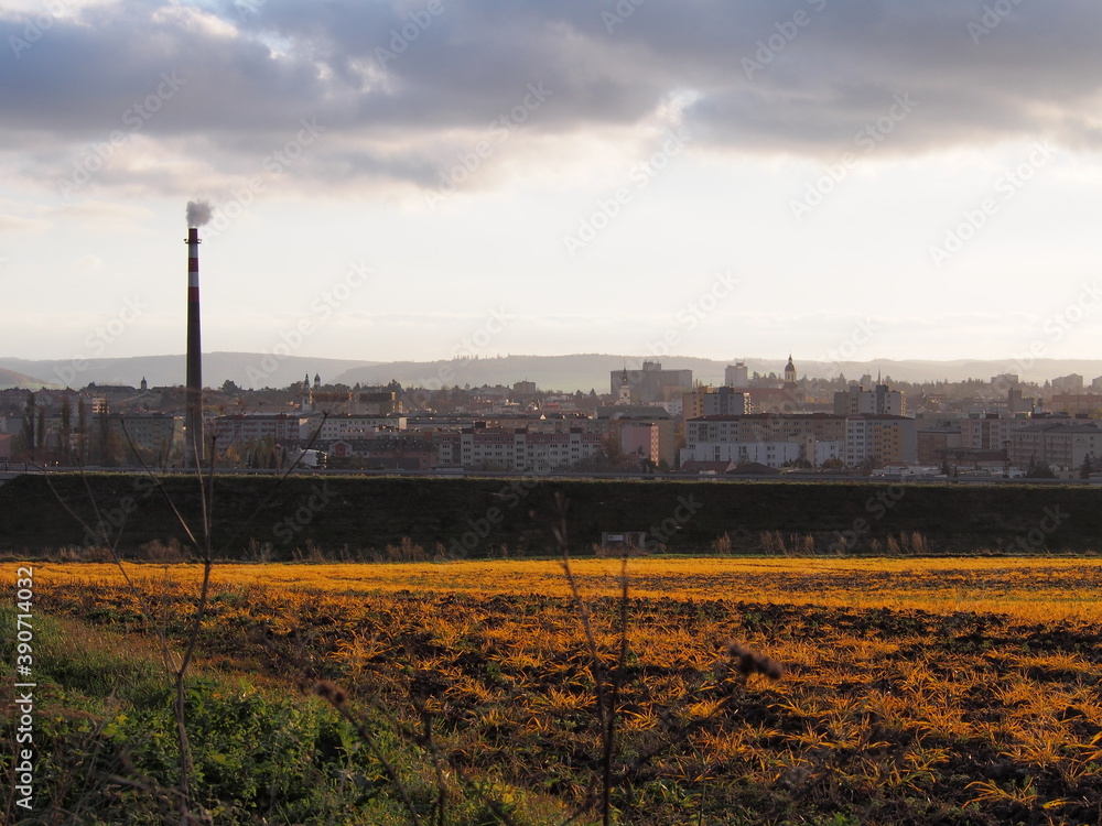 autumn sunset on the field above the city, view of Opava in the late sunny afternoon, panorama, background wallpaper autumn sunset on the field above the city, view of Opava in the late sunny afternoon, panorama, background wallpaper