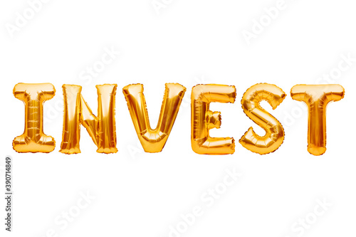 Word Invest made of golden inflatable balloons isolated on white. Helium gold foil balloons forming text. Money, finance and investments concept.