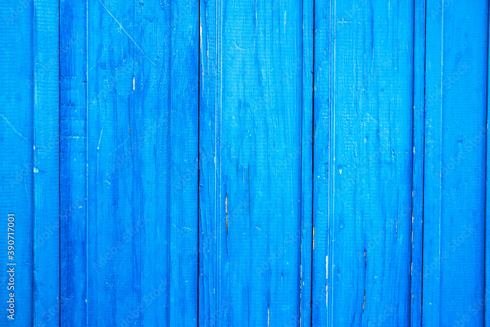 Wooden protection on all background, is painted light blue. old cracked blue paint on wood flooring. Wooden protection on all background, is painted light blue. old cracked blue paint on wood flooring.