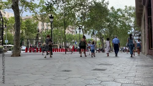 Time lapse footage of people walking on famous luxury shopping street called 