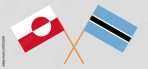 Crossed flags of Botswana and Greenland photo