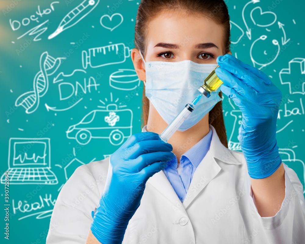 Human hands with injection syringe and vaccine Human hands with injection syringe and vaccine