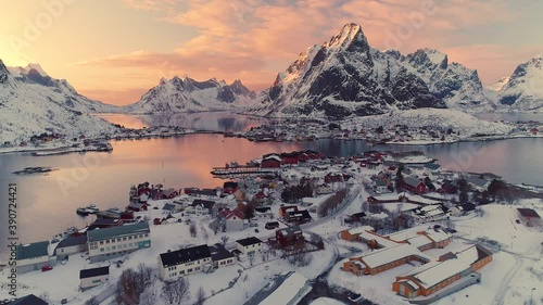 Aerial footage and timelapse over fisherman village in winter time , fjords in Lofoten archipelago in northern Norway 