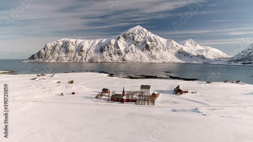 Aerial footage and timelapse over fisherman village in winter time , fjords in Lofoten archipelago in northern Norway