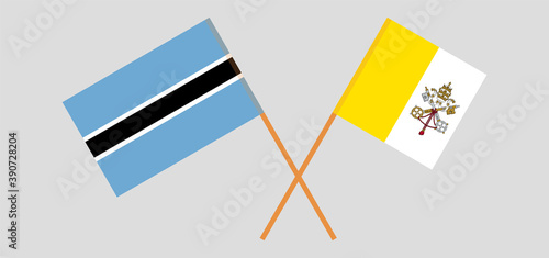 Crossed flags of Botswana and Vatican