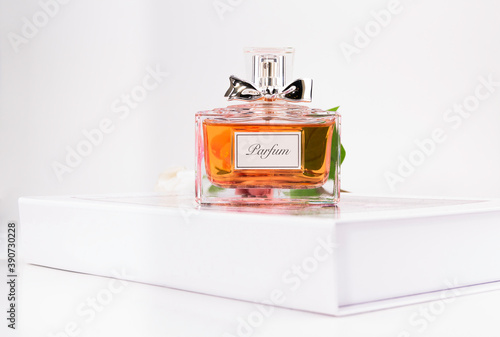  Perfume bottle on the white box  
