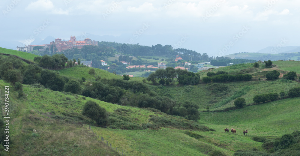 Green hills and meadows nearby the town of Comillas, cantabria, Spain