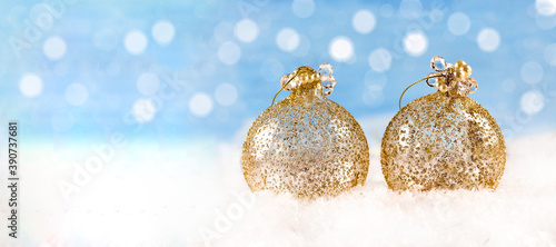 Flatley Christmas. Festive Christmas background. New Year's and Christmas. Christmas card background. Christmas golden balls on the snow. Gift. Banner.