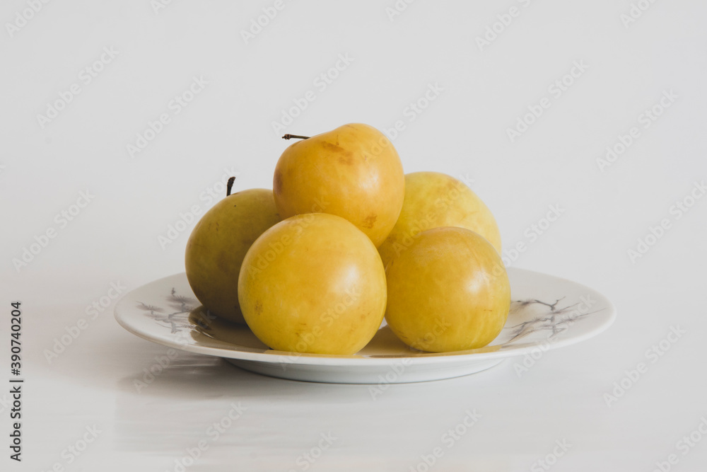 Mirabelle plums on plate