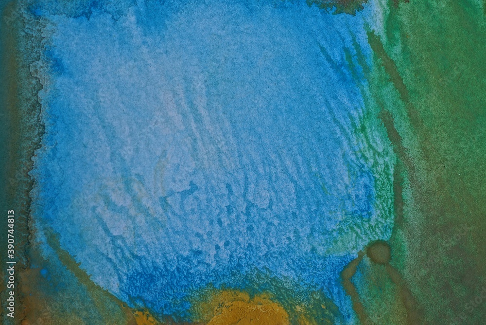 green blue watercolor stain texture on a paper sheet