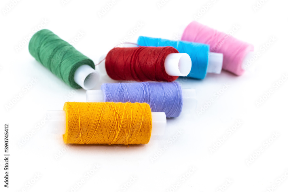 assortment of cotton skeins of orange, red and green material for needlework assortment of cotton skeins of orange, red and green material for needlework