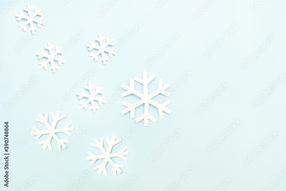 Obraz Snow flakes made from cut out paper. A simple concept of minimalist holidays.
