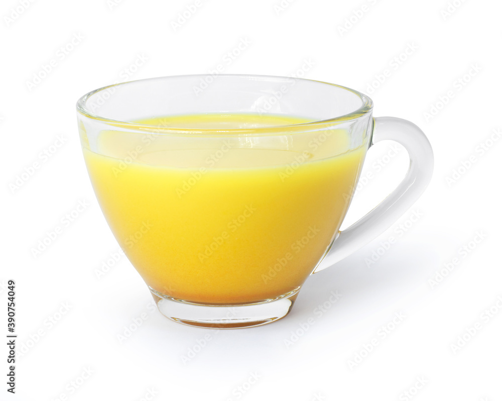 Golden milk ( turmeric latte ) in glass cup isolated on white background. Clipping path. Golden milk ( turmeric latte ) in glass cup isolated on white background. Clipping path.