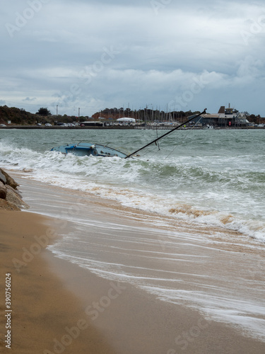 Ship Wreck Of Small Yacht Washed Up On Beach