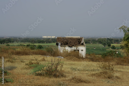 abandoned farm house in the field