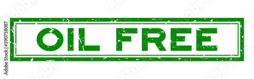 Grunge green oil free word rubber seal stamp on white background