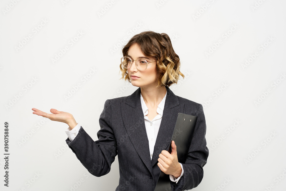 Woman in business suit finances work documents glasses hairstyle Woman in business suit finances work documents glasses hairstyle
