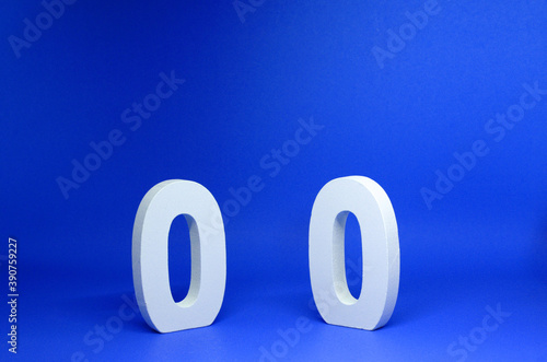 None or Zero ( 0 ) white wooden  Isolated Blue Background with Copy Space - New promotion 0% Percentage  Business finance Concept photo