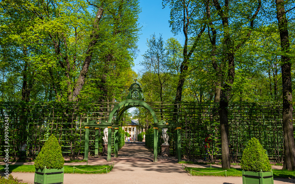 View through the Summer Garden with fountains. The Summer Garden is located on an island between Fontanka, Moika and the Swan Canal in St. Petersburg, Russia.