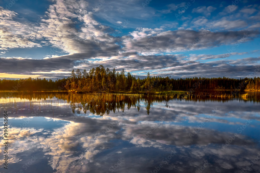 Sunset over a lake in northern Sweden, near Dorotea Sunset over a lake in northern Sweden, near Dorotea