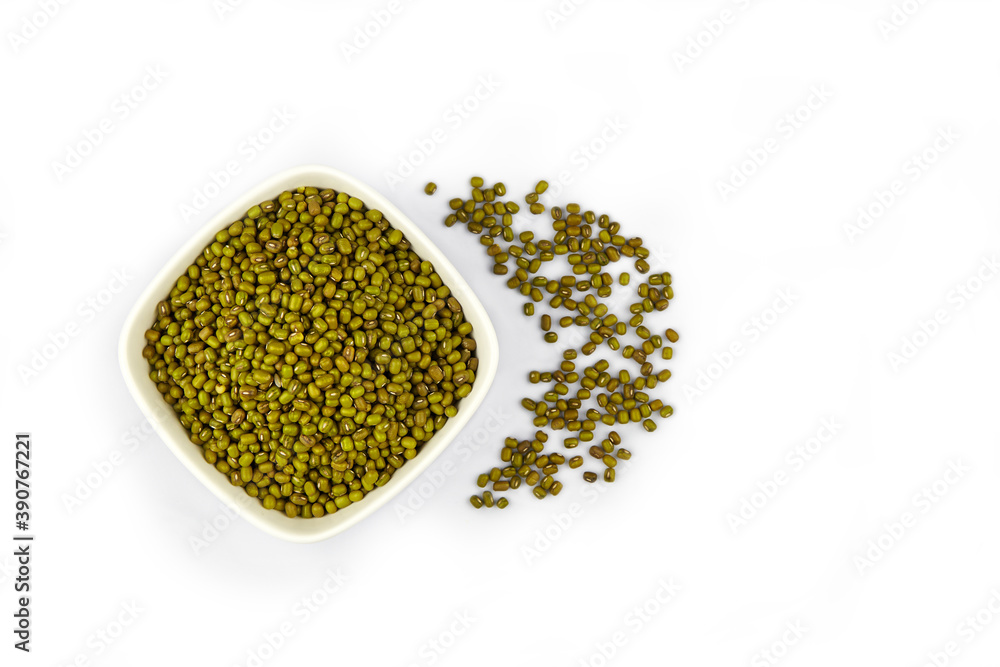 Mung beans in ceramic bowl isolated on white background, top view Mung beans in ceramic bowl isolated on white background, top view