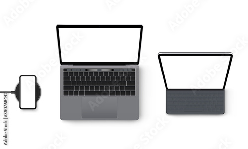 Laptop Computer, Tablet, Smartphone on Wireless Charger Mockup, Isolated on White Background, View From Above. Vector Illustration