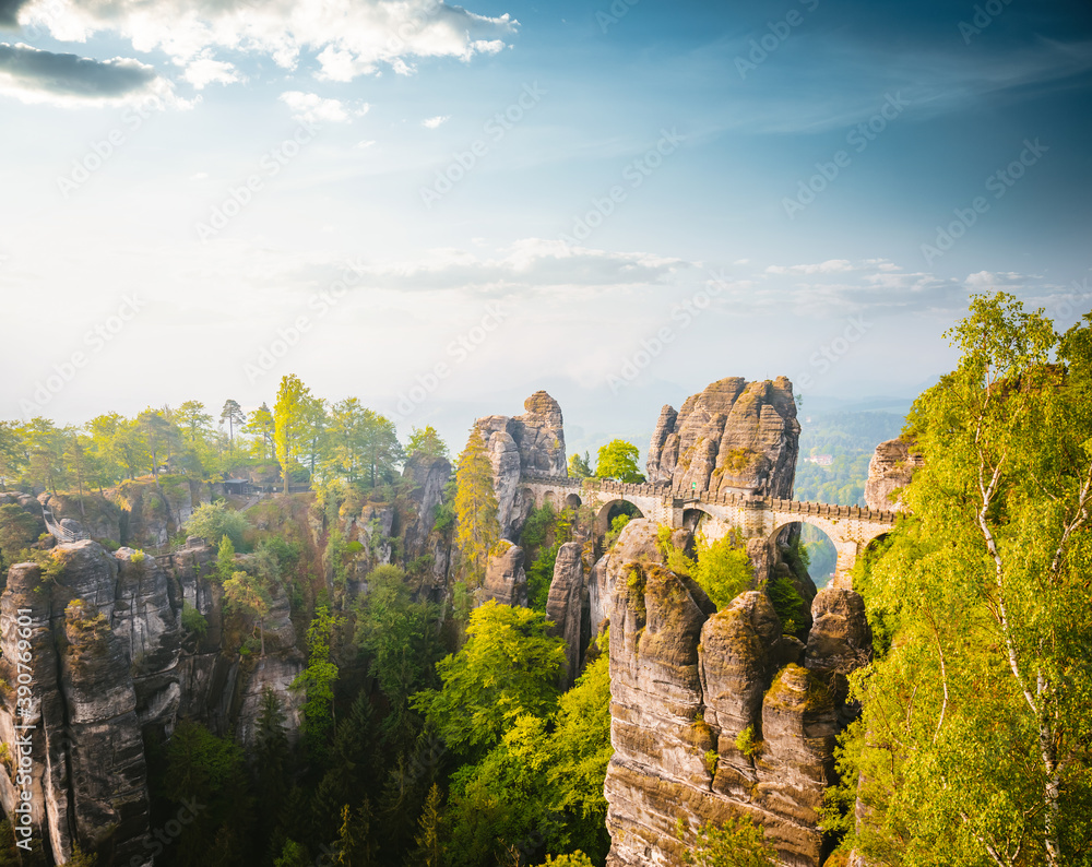 Elbe Sandstone Mountains in sunlight at day. Location Saxon Switzerland national park, Germany, Europe.