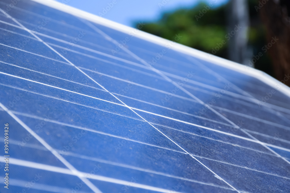 Photovoltaic panel on the roof of the building, concept for sustainably energy at home around the world. Photovoltaic panel on the roof of the building, concept for sustainably energy at home around the world.