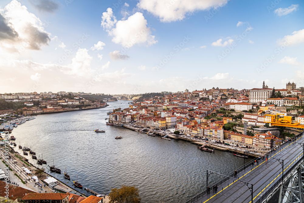View of the city of Porto seen by the city Vila Nova de Gaia in Portugal, Luis IV bridge, Douro River and Por do sol. November 05, 2019.