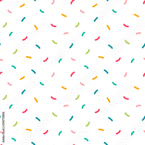 Colorful confetti sprinkles vector seamless pattern background for party design.