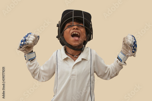 Photography Portrait of boy celebrating his success in cricket