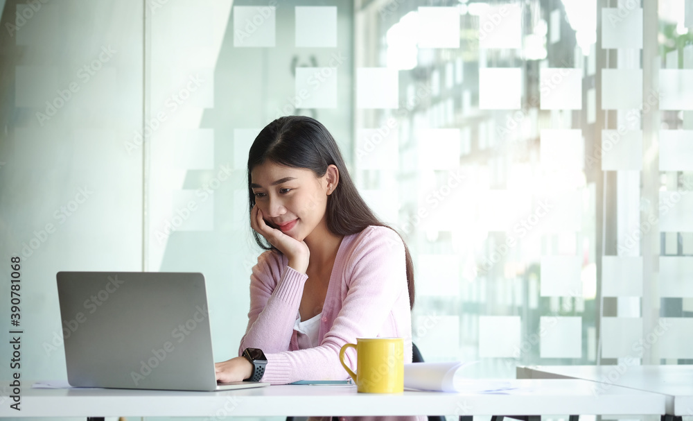 Portrait businesswoman using laptop for work on work space. Portrait businesswoman using laptop for work on work space.
