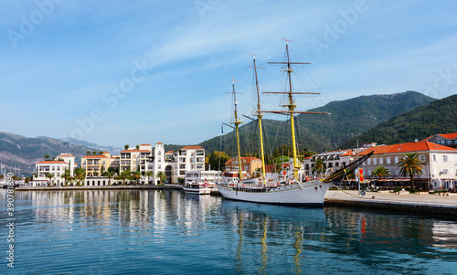 Pine embankment. Embankment and port "Porto Montenegro". Tivat. Montenegro. Lustica Bay is a mini city with a yacht marina. Buildings on the embankment of the city of Tivat.
