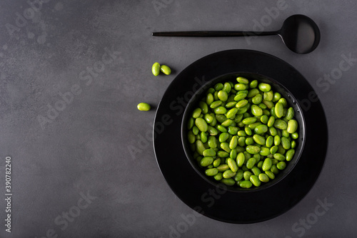 Japanese green beans in a black bowl