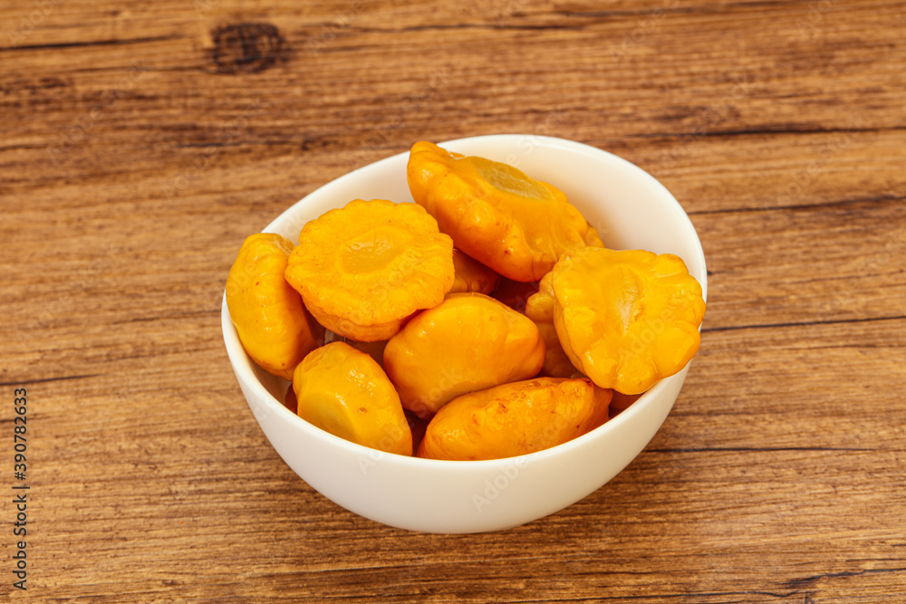 Marinated yellow patisson in the bowl Marinated yellow patisson in the bowl