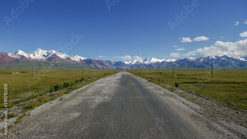 View of the snow-capped Trans-Alay mountain range from the road between Sary Tash and high altitude Kyzyl Art pass in southern Kyrgyzstan leading to the border with Tajikistan © Cyril Redor