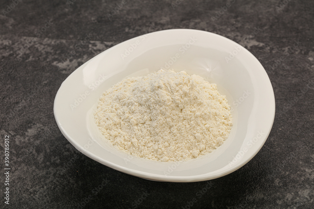 Wheat flour heap in the bowl Wheat flour heap in the bowl