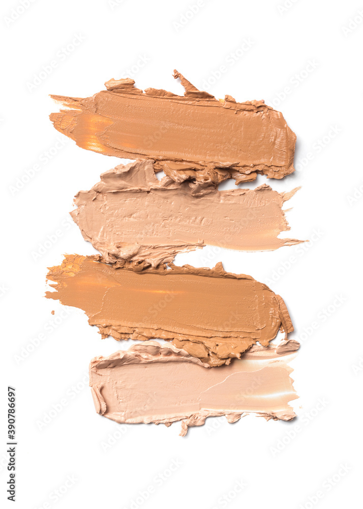 Close-up of make-up swatches. Smears of beige skincare beauty product concealer or foundation Close-up of make-up swatches. Smears of beige skincare beauty product concealer or foundation