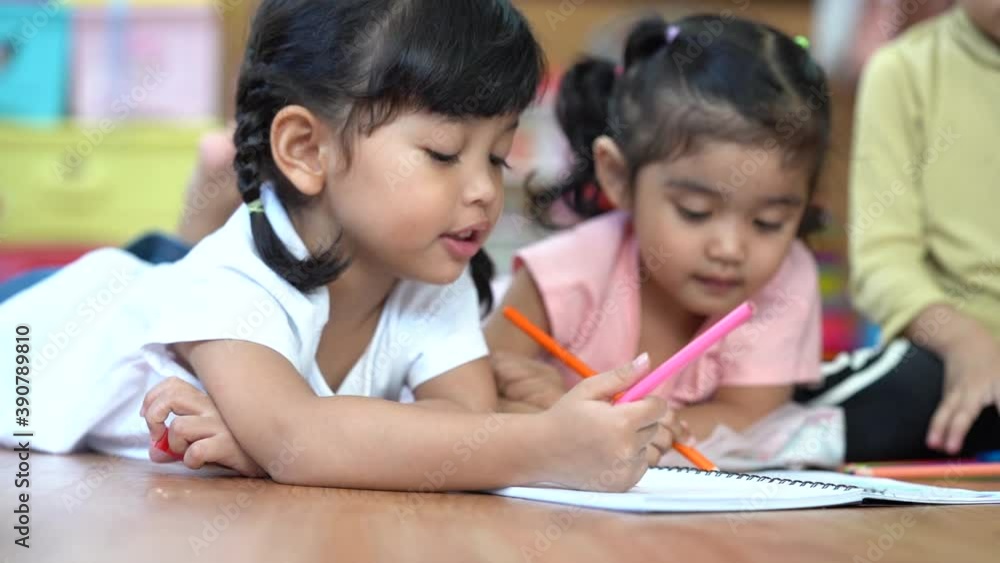 Children drawing and painting color on paper with happiness. Children drawing and painting color on paper with happiness.